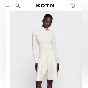 Cream / off white Kotn turtleneck top